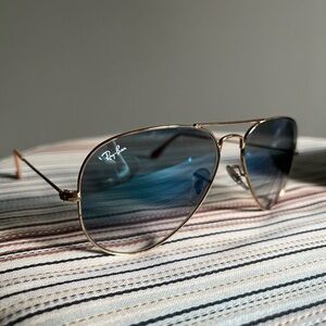 Ray Ban lightly blue tinted gold-rimmed aviator sunglasses